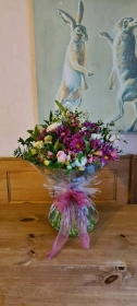 Seasonal Selection of Colours Hand Tied Bouquet in an Aqua Pack   Florist's Choice